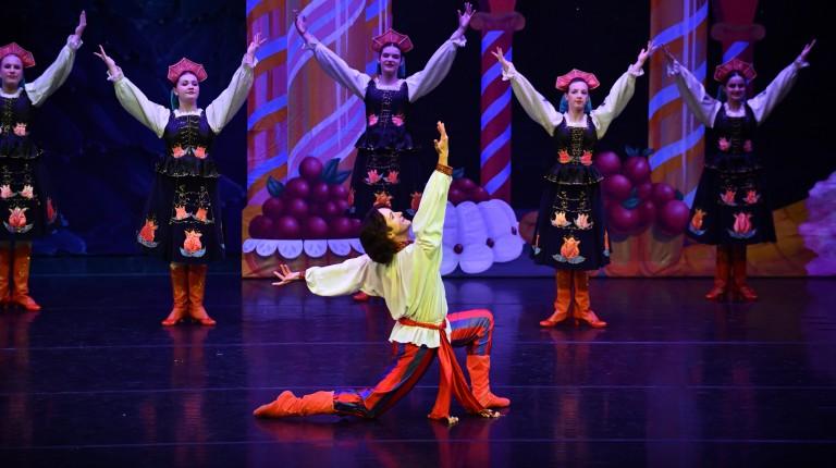 Trevor Seymour dances with cast-mates as The Russian Soloist in Maine State Ballet's "The Nutcracker"